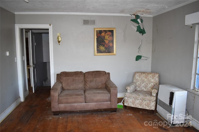 living room featuring a textured ceiling, dark hardwood / wood-style floors, and heating unit