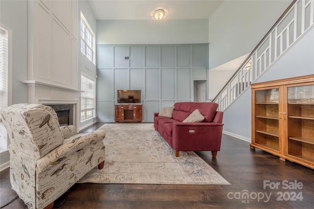 living room with dark wood-type flooring