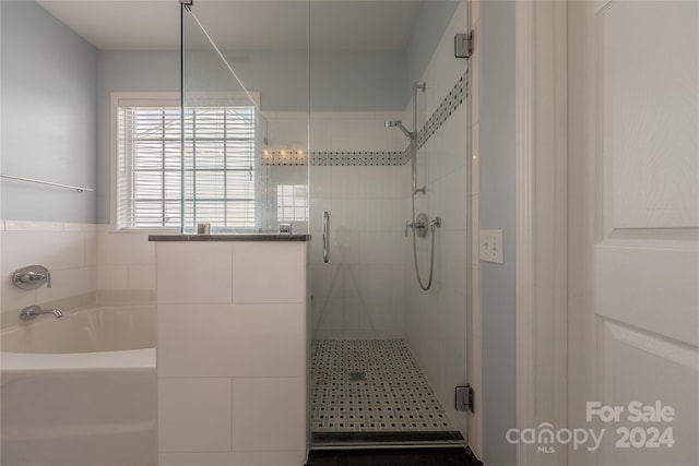 bathroom with plus walk in shower