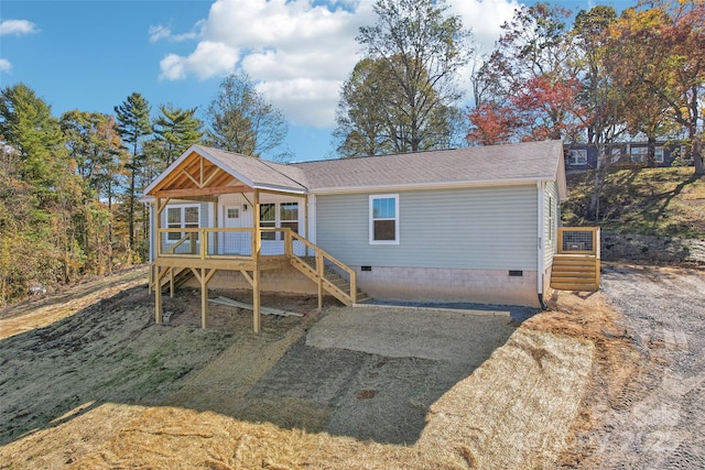 view of front of house featuring a deck