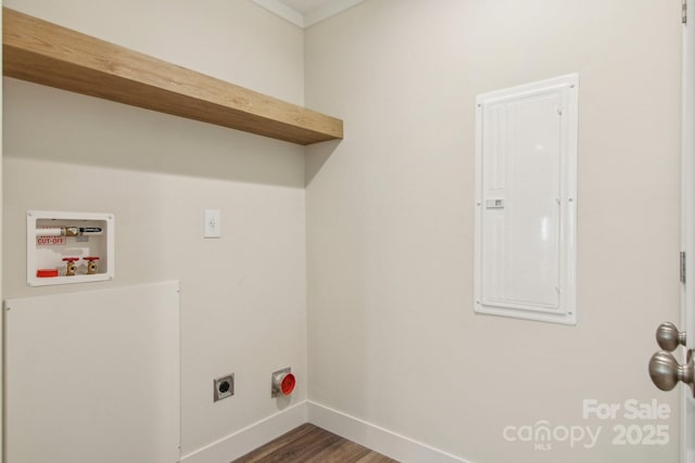 washroom featuring hookup for an electric dryer, hookup for a washing machine, dark wood-type flooring, and electric panel