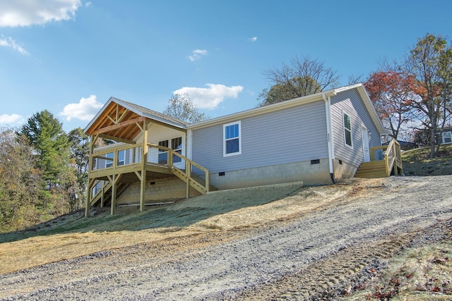 view of front of house featuring a deck