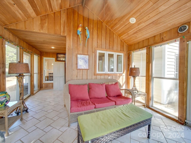 living room featuring wood ceiling, lofted ceiling, and wooden walls