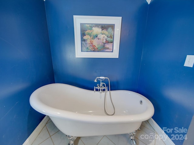 bathroom featuring a bathing tub and tile patterned floors