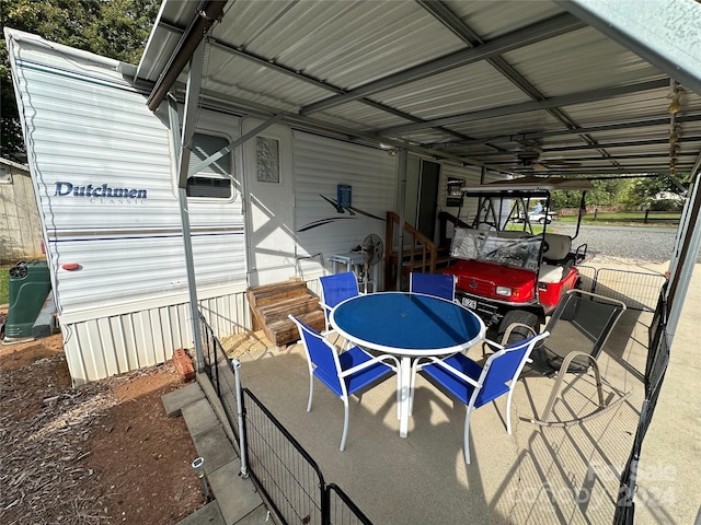 view of patio / terrace with a carport