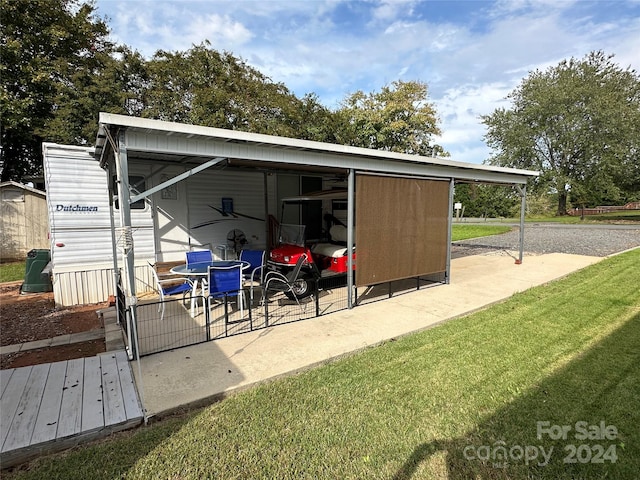 view of outdoor structure with a yard