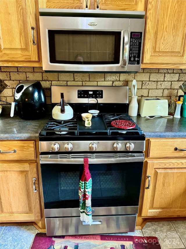 kitchen with appliances with stainless steel finishes