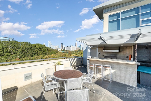 view of patio / terrace with an outdoor bar