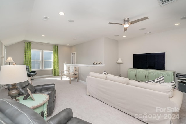 living room featuring light carpet and ceiling fan