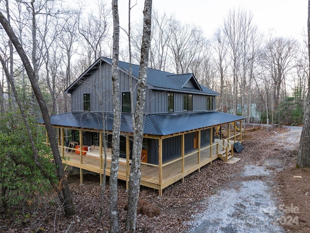 rear view of house with a deck