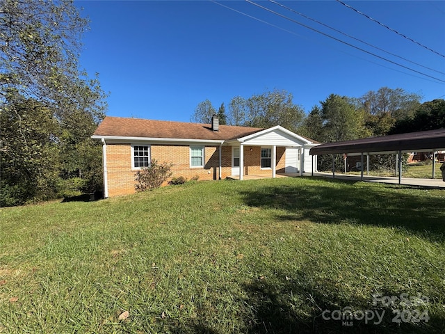 view of front of home featuring a front yard