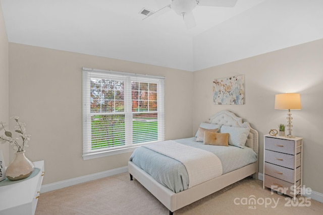 bedroom with ceiling fan and light carpet