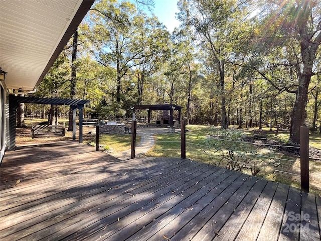 wooden terrace with a gazebo and a pergola