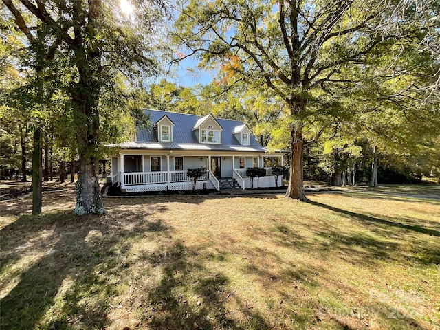 view of front of property with a porch and a front yard