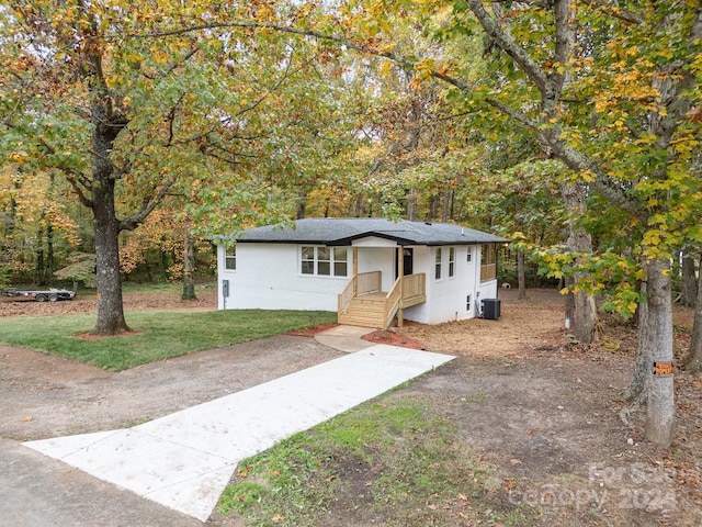 view of front of home featuring cooling unit