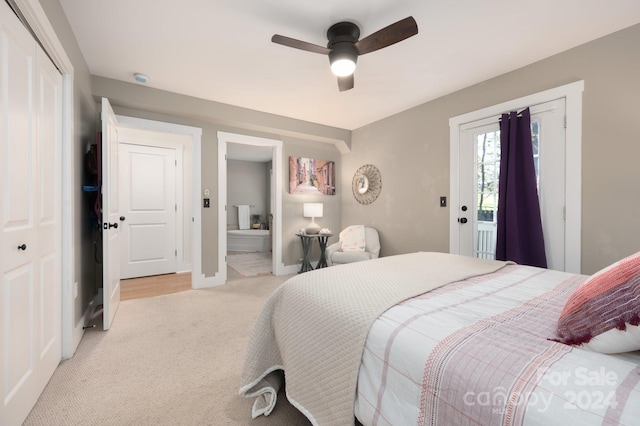 carpeted bedroom with a closet, access to exterior, and ceiling fan