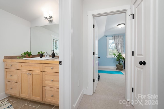 bathroom with vanity and tile patterned flooring