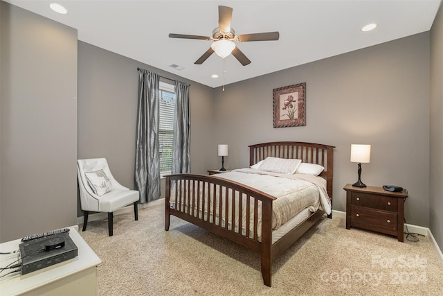 bedroom featuring ceiling fan and light colored carpet