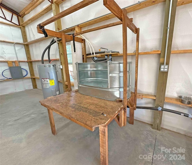 utility room featuring water heater