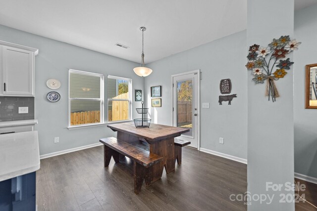 dining room featuring dark hardwood / wood-style floors