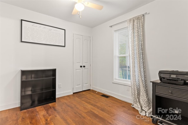 interior space with hardwood / wood-style flooring and ceiling fan