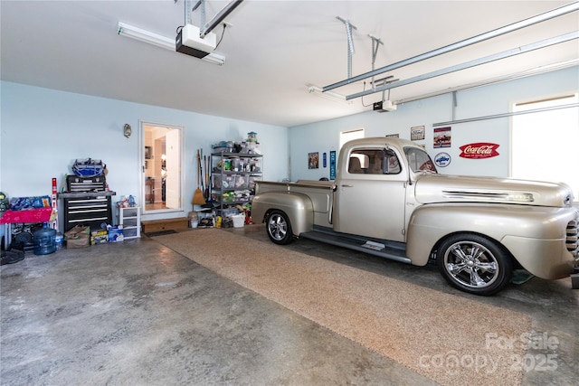 garage featuring a garage door opener