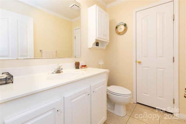 bathroom featuring toilet, tile patterned flooring, crown molding, and vanity