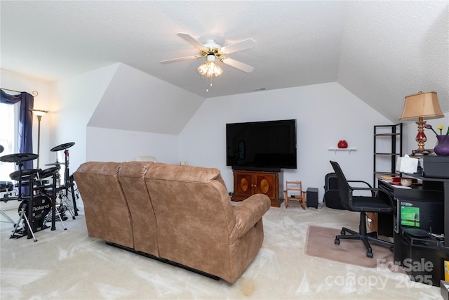 carpeted living room featuring lofted ceiling, a textured ceiling, and ceiling fan