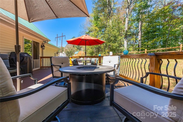 wooden terrace with area for grilling