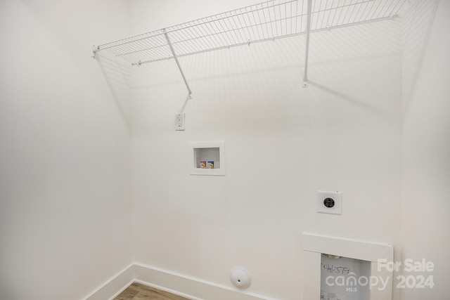 laundry area featuring hookup for a gas dryer, hookup for a washing machine, and hookup for an electric dryer