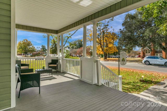 deck featuring covered porch