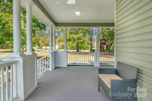 view of patio featuring a porch