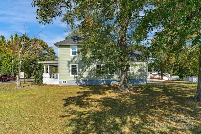 exterior space featuring a lawn