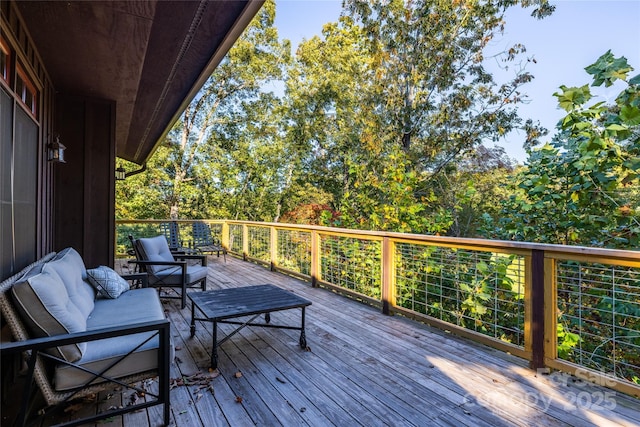 deck featuring outdoor lounge area