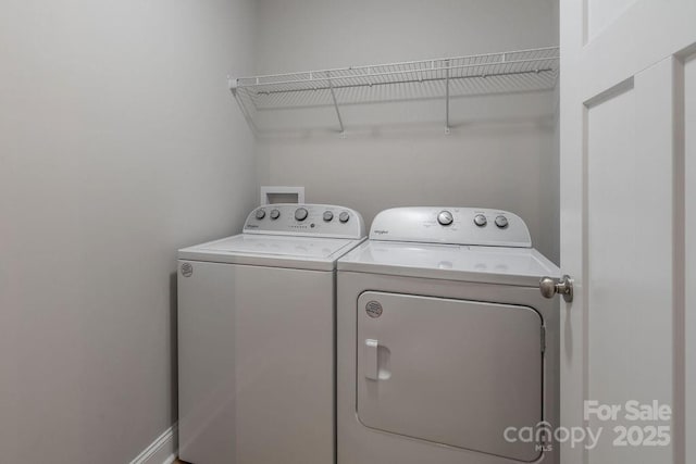 laundry area featuring laundry area and independent washer and dryer