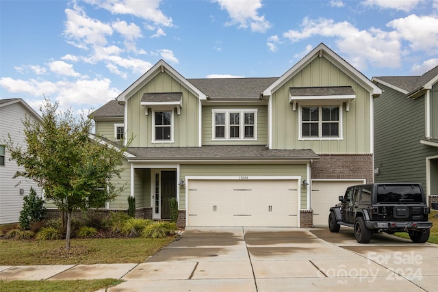 craftsman inspired home featuring a garage