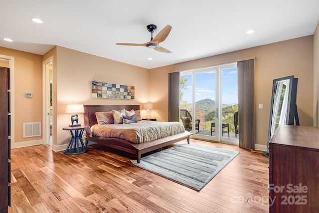 bedroom with ceiling fan, access to exterior, and light wood-type flooring