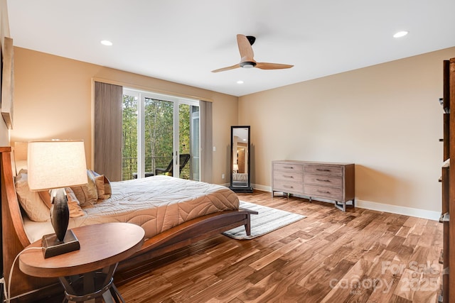 bedroom with access to exterior, light hardwood / wood-style floors, and ceiling fan