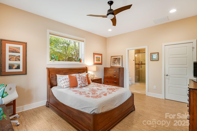 bedroom with ceiling fan and ensuite bathroom