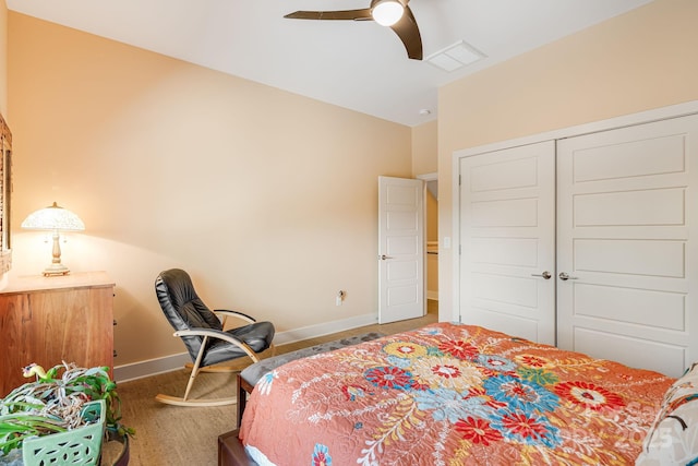 bedroom featuring vaulted ceiling, ceiling fan, and a closet