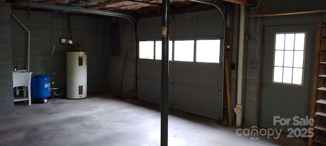 garage with electric water heater