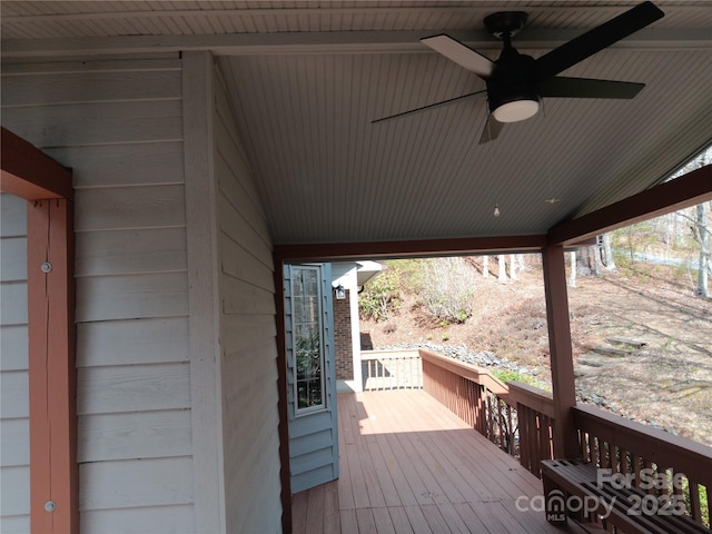 wooden deck with ceiling fan