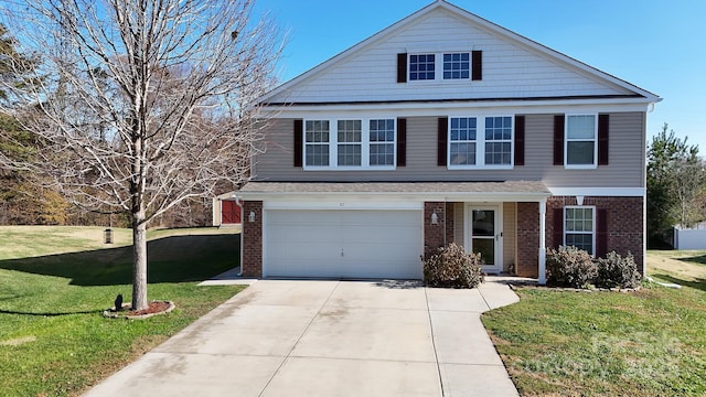 front of property with a front yard and a garage