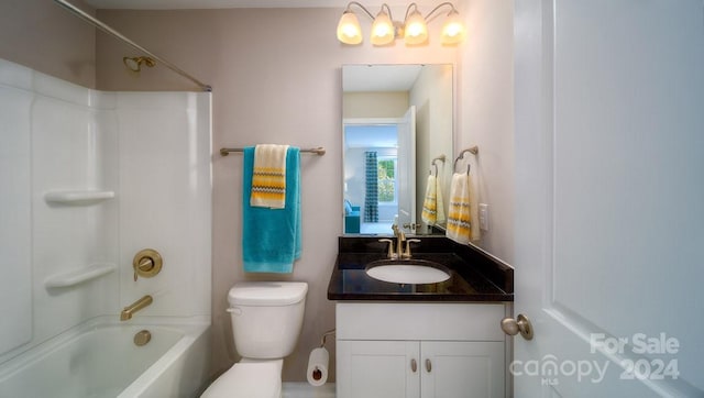 full bathroom featuring vanity, shower / washtub combination, and toilet