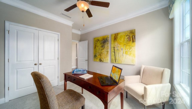 home office with ornamental molding, light colored carpet, and ceiling fan