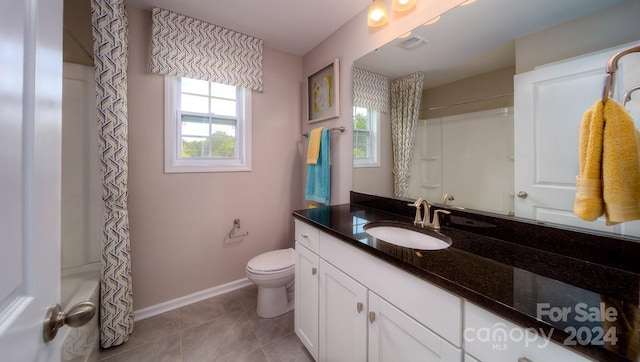 full bathroom with vanity, shower / bathtub combination, toilet, and tile patterned flooring