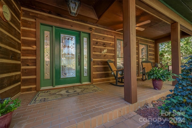 doorway to property featuring a porch