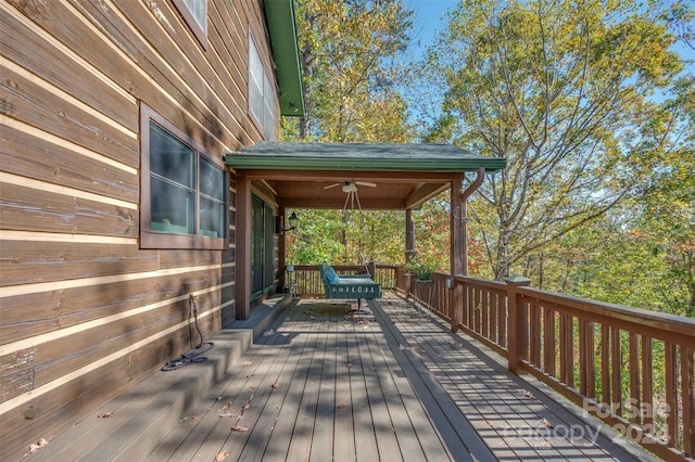 wooden deck with ceiling fan