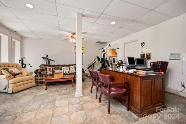 office featuring a drop ceiling and ceiling fan