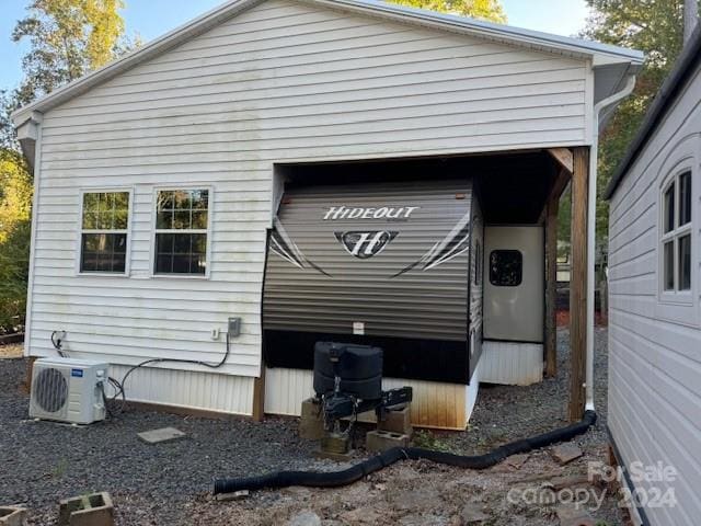 view of home's exterior featuring ac unit